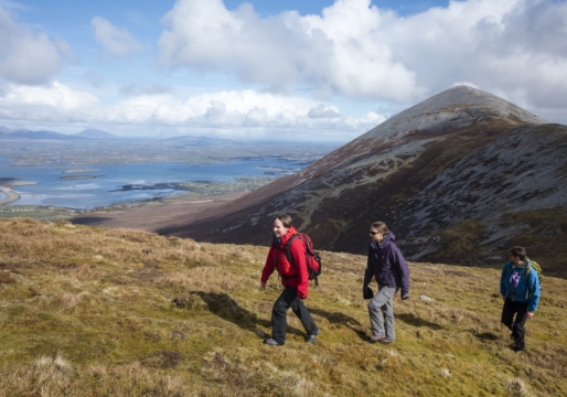 Hikers on Ben Goram, with Croagh Patrick behind, County Mayo, Ireland.  © Gareth McCormack