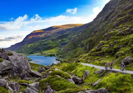 4 people on bicycles make their way up the Gap of Dunloe , Co. Kerry, Ireland: © Chris Hill Photographic